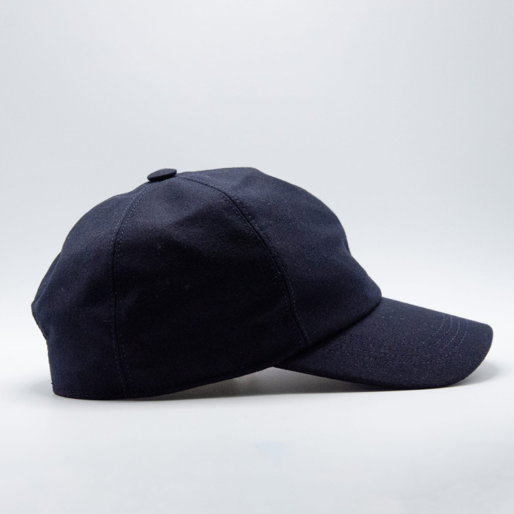 Sidovy av marinblå Wigéns Baseball Cap