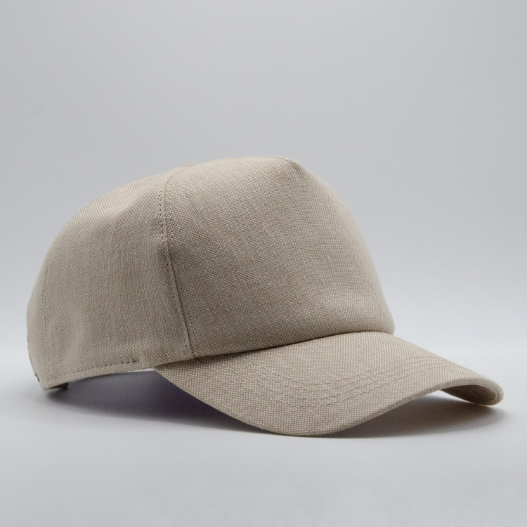 Beige baseballkeps från Wigéns sedd framifrån