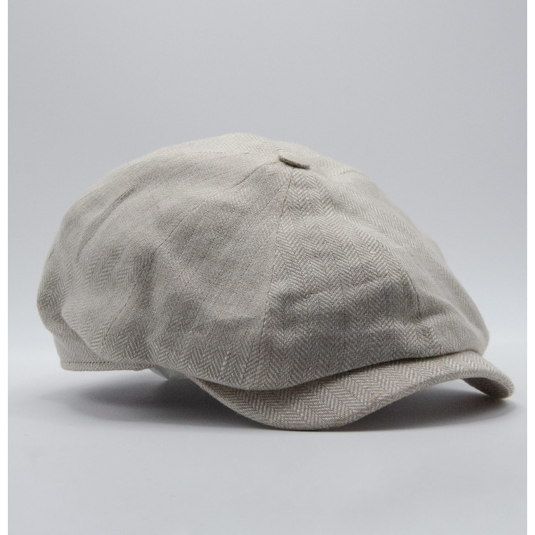 Ljusbeige gubbkeps från Wigéns snett framifrån