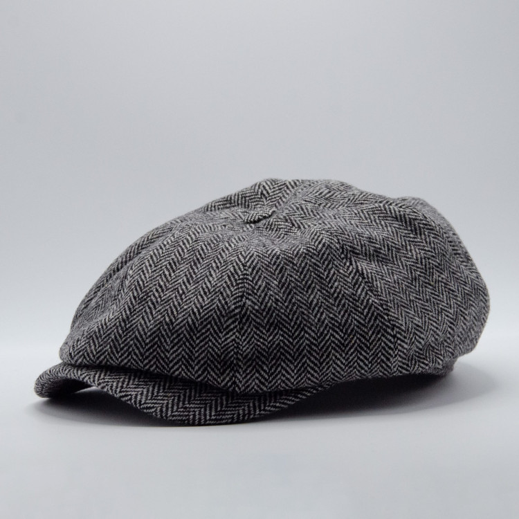 Mörkgrå Wigéns News Boy Classic Cap snett framifrån