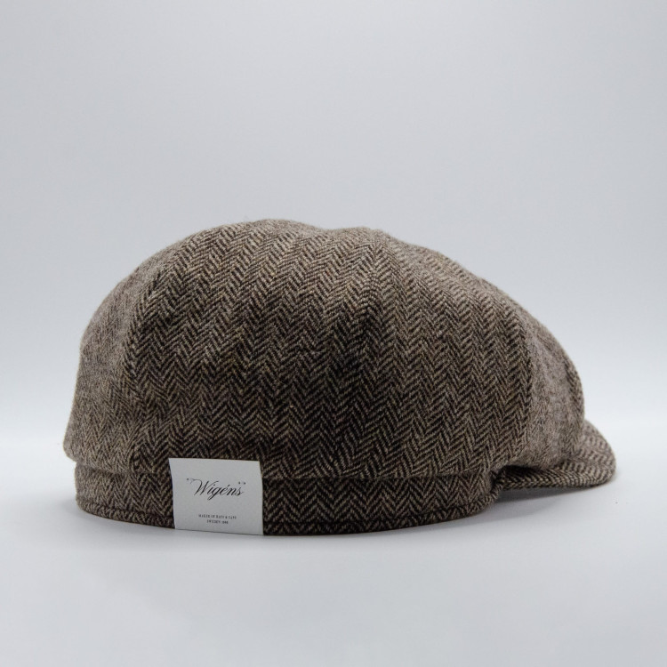 Sidovy av brunmelerad Wigéns News Boy Classic Cap med Wigéns-etikett